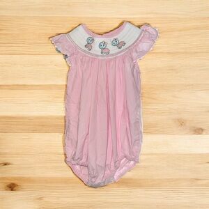 Pink baby girl's smocked bubble romper with embroidered turtle details  18-24m